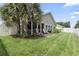Well maintained backyard with a patio area and landscaping at 424 Enderby Way, Little River, SC 29566
