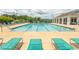 Inviting community pool with ample lounge seating, perfect for relaxation and recreation at 424 Enderby Way, Little River, SC 29566