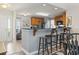 Open-concept kitchen with breakfast bar and ample seating, ideal for entertaining guests at 424 Enderby Way, Little River, SC 29566
