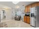 Bright eat-in kitchen with stainless steel appliances and a cozy seating area near a window at 424 Enderby Way, Little River, SC 29566