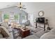 Inviting living room with vaulted ceiling, comfortable seating, and a relaxing atmosphere at 424 Enderby Way, Little River, SC 29566