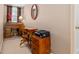 Home office with a charming wooden desk, comfortable chair, and printer stand with built-in drawers at 439 Colonial Trace Dr. # 119, Longs, SC 29568