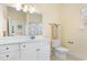 Well-lit bathroom with a single vanity, toilet, and shower-tub combination at 4413 Plantation Harbour Dr. # A, Little River, SC 29566