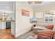 Comfortable living room open to the kitchen with stylish decor and ample natural light at 4413 Plantation Harbour Dr. # A, Little River, SC 29566