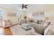 Cozy living room features plush seating, hardwood floors, and neutral decor at 4413 Plantation Harbour Dr. # A, Little River, SC 29566