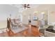 Cozy loft area with comfortable seating, hardwood floors, and access to multiple rooms at 4413 Plantation Harbour Dr. # A, Little River, SC 29566