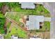 Aerial view of the home showcasing the backyard, deck and mature landscaping at 4419 Kinlaw St., Little River, SC 29566
