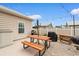 Outdoor patio featuring a picnic table, grill, and storage bin, great for entertaining guests at 4419 Kinlaw St., Little River, SC 29566