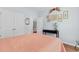 Comfortable bedroom showcasing a peach quilt, console table, and decorative wall art at 4419 Kinlaw St., Little River, SC 29566