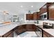 Open-concept kitchen with breakfast bar, granite countertops, stainless steel appliances, and plenty of counter space at 4419 Kinlaw St., Little River, SC 29566
