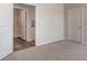 Bedroom showcasing neutral carpet, a white door, and a glimpse into the bathroom at 442 Acosta Circle, Conway, SC 29527