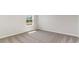 Bright bedroom with neutral carpet, white trim, window with backyard view at 442 Acosta Circle, Conway, SC 29527