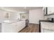 Modern kitchen featuring stainless steel appliances, granite countertops, and wood-look flooring at 442 Acosta Circle, Conway, SC 29527