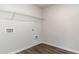 Functional laundry room with sleek wood flooring and utility connections at 442 Acosta Circle, Conway, SC 29527