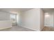Bright room with neutral walls and carpet, plus a window offering a view outside at 442 Acosta Circle, Conway, SC 29527