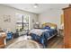 Well lit bedroom featuring ceiling fan, area rug, and a bright window at 4497 Little River Inn Ln. # 1502, Little River, SC 29566