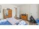 Bedroom with wood-look floors, walk-in closet, and a view to the bathroom and second closet at 4497 Little River Inn Ln. # 1502, Little River, SC 29566
