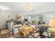 Cozy living area featuring an adjacent kitchen, a dining space, and lots of natural light at 4497 Little River Inn Ln. # 1502, Little River, SC 29566
