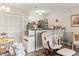 Comfortable open-concept living area with a kitchen, dining space, and cozy reading nook at 4497 Little River Inn Ln. # 1502, Little River, SC 29566