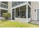 Cozy screened porch with direct outdoor access and an inviting welcome sign at 4497 Little River Inn Ln. # 1502, Little River, SC 29566