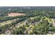 Wide aerial view of the neighborhood showcasing home's location in a community with numerous mature trees at 450 Player St., Georgetown, SC 29440