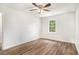 Bedroom featuring hardwood floors and a window letting in natural light at 450 Player St., Georgetown, SC 29440