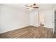 Bedroom boasts hardwood floors, ceiling fan, and access to an ensuite bathroom at 450 Player St., Georgetown, SC 29440