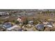 An aerial view showing the home's location near a marsh, surrounded by trees and other residences at 4616 Eyerly St., North Myrtle Beach, SC 29582