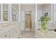 Elegant bathroom featuring a soaking tub, separate shower, and dual vanity sinks at 4616 Eyerly St., North Myrtle Beach, SC 29582