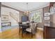 Dining room with hardwood floors, chandelier, and natural light at 4616 Eyerly St., North Myrtle Beach, SC 29582