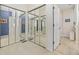 Hallway with mirrored closet doors and neutral decor, leading to multiple rooms at 4616 Eyerly St., North Myrtle Beach, SC 29582