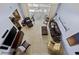 Aerial view of the living room with plush seating, large windows, and an entertainment center with a TV at 4616 Eyerly St., North Myrtle Beach, SC 29582