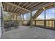 Outdoor patio features a metal table set, stairs leading to the yard, and a relaxing ambiance at 4616 Eyerly St., North Myrtle Beach, SC 29582