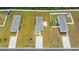 Birds eye view of three similar homes, showcasing lawn sizes, landscaping, driveways and privacy fences at 478 Samara Dr., Longs, SC 29568