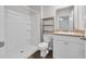 Bathroom with a walk-in shower, shelving and a single sink vanity at 478 Samara Dr., Longs, SC 29568