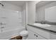 Bathroom featuring a shower-tub combo and modern vanity with a gray countertop at 478 Samara Dr., Longs, SC 29568