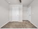 A basic bedroom showing two closet doors and neutral carpeting at 478 Samara Dr., Longs, SC 29568