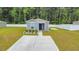 A single-story home with a concrete driveway and a well-maintained front yard at 478 Samara Dr., Longs, SC 29568