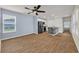 Open concept living and kitchen area featuring stainless steel appliances and plenty of natural light at 478 Samara Dr., Longs, SC 29568