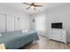 Cozy bedroom featuring a ceiling fan and closet at 4887 Luster Leaf Circle # 105, Myrtle Beach, SC 29577