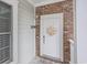 Condominium front door with a welcoming wreath at 4887 Luster Leaf Circle # 105, Myrtle Beach, SC 29577
