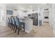 Well-equipped kitchen with stainless steel appliances and a bar counter at 4887 Luster Leaf Circle # 105, Myrtle Beach, SC 29577