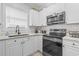 Modern kitchen with sleek appliances and ample counter space at 4887 Luster Leaf Circle # 105, Myrtle Beach, SC 29577