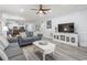 Open living room boasts a ceiling fan, recessed lighting, and an open floor plan to the kitchen at 4887 Luster Leaf Circle # 105, Myrtle Beach, SC 29577