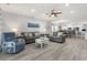Bright living room features neutral tones, comfortable seating, and an open floor plan to the kitchen at 4887 Luster Leaf Circle # 105, Myrtle Beach, SC 29577