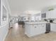 Bright, open-concept living space with stylish decor and a kitchen view at 4887 Luster Leaf Circle # 105, Myrtle Beach, SC 29577