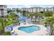 Apartment complex pool and seating with beautiful lake views for relaxing or socializing at 4887 Luster Leaf Circle # 105, Myrtle Beach, SC 29577