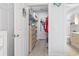 Spacious walk-in closet with custom shelving and storage solutions at 4887 Luster Leaf Circle # 105, Myrtle Beach, SC 29577