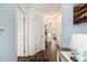 Bright hallway with hardwood floors leading to kitchen and living areas, light blue paint at 4925 Pond Shoals Ct. # 202, Myrtle Beach, SC 29579