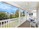 Relaxing screened porch with pond view provides a serene outdoor living space to enjoy nature and the water at 4925 Pond Shoals Ct. # 202, Myrtle Beach, SC 29579